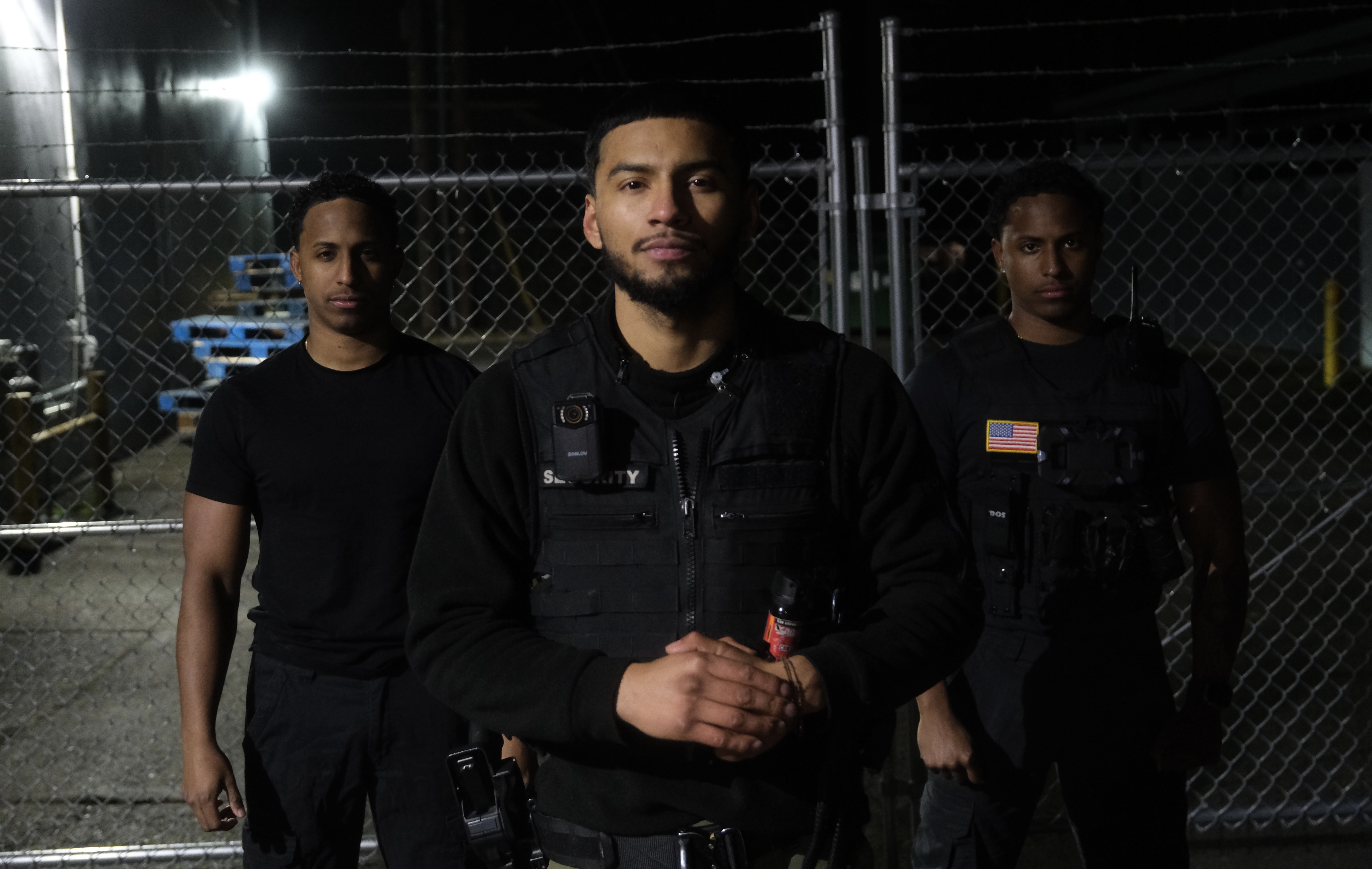 3 Security professional standing on the gate